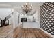 Open concept dining area next to the kitchen that offers a stunning chandelier at 20802 N Grayhawk Dr # 1123, Scottsdale, AZ 85255