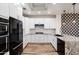 Bright kitchen with stainless steel appliances, granite countertops, and modern finishes at 20802 N Grayhawk Dr # 1123, Scottsdale, AZ 85255