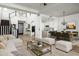 Open concept living space with staircase, seamlessly connecting the kitchen and dining areas at 20802 N Grayhawk Dr # 1123, Scottsdale, AZ 85255
