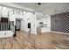 Open concept living area with fireplace and stairs at 20802 N Grayhawk Dr # 1123, Scottsdale, AZ 85255