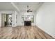 Bright living room with fireplace and wood floors at 20802 N Grayhawk Dr # 1123, Scottsdale, AZ 85255