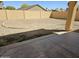 Large backyard space prepped for landscaping with concrete patio at 20941 N Leona Blvd, Maricopa, AZ 85138