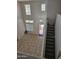 Bright living room with high ceilings, lots of natural light, and tiled flooring at 20941 N Leona Blvd, Maricopa, AZ 85138