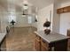 Open-concept living room with tile flooring, ceiling fans, and lots of natural light at 20941 N Leona Blvd, Maricopa, AZ 85138