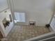 Bright living room with high ceilings, lots of natural light, and tiled flooring at 20941 N Leona Blvd, Maricopa, AZ 85138