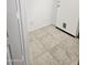 Mud room with white door and tile flooring at 20941 N Leona Blvd, Maricopa, AZ 85138
