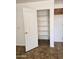 This home has a large walk-in pantry with built in shelving at 20941 N Leona Blvd, Maricopa, AZ 85138
