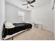 Comfortable bedroom featuring a ceiling fan and carpeted floors at 23937 W Hopi St, Buckeye, AZ 85326