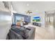 Comfortable living room with neutral color palette and patio access at 23937 W Hopi St, Buckeye, AZ 85326