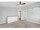 Neutral bedroom featuring plush carpet, counter, and access to a bathroom with a sliding barn door at 2400 E Baseline Ave # 228, Apache Junction, AZ 85119
