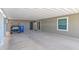 Spacious carport featuring a golf cart, ample parking, and convenient access to the home at 2400 E Baseline Ave # 228, Apache Junction, AZ 85119