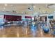 Spacious community room with ample seating, stage area, and versatile event space at 2400 E Baseline Ave # 228, Apache Junction, AZ 85119