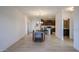 Open living space featuring a dining area, kitchen, and tile floors at 2511 W Queen Creek Rd # 337, Chandler, AZ 85248