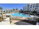 Resort-style pool area with lounge chairs and manicured landscaping for ultimate relaxation at 2511 W Queen Creek Rd # 337, Chandler, AZ 85248
