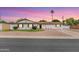 Charming home with a manicured front yard, gravel landscaping, and a welcoming facade at 2614 E Mountain View Rd, Phoenix, AZ 85028