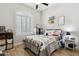 Cozy bedroom with ample natural light and a ceiling fan perfect for a room at 26271 N 46Th St, Phoenix, AZ 85050