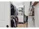 Functional walk-in closet with built-in shelving, drawers, and ample storage space at 26271 N 46Th St, Phoenix, AZ 85050