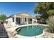 Aerial view of a backyard showcasing a private pool and covered patio area at 2641 E Brooks St, Gilbert, AZ 85296