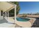 Backyard featuring an inviting pool, covered patio, and landscaped surroundings at 2641 E Brooks St, Gilbert, AZ 85296