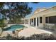 A private backyard featuring a refreshing pool with an attached covered patio at 2641 E Brooks St, Gilbert, AZ 85296