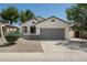 Charming single-story home with a two-car garage and desert landscaping at 2641 E Brooks St, Gilbert, AZ 85296