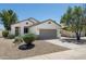 Charming single-story home with a two-car garage and desert landscaping at 2641 E Brooks St, Gilbert, AZ 85296
