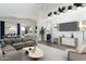 Open-concept living room showcasing a modern design with neutral tones and backyard views at 2641 E Brooks St, Gilbert, AZ 85296