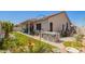 Beautiful backyard with lush artificial turf, a hot tub, and a covered patio for outdoor living at 2839 S Copperwood --, Mesa, AZ 85212