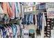 Walk-in closet with custom shelving and rods for ample storage and organization at 2839 S Copperwood --, Mesa, AZ 85212