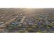 An aerial shot of a peaceful suburban neighborhood nestled in the desert with mountain views at 28408 N 52Nd Way, Cave Creek, AZ 85331
