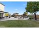 Expansive backyard with a lush lawn, pool, and inviting patio perfect for outdoor entertaining at 28408 N 52Nd Way, Cave Creek, AZ 85331