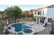 Aerial view of a private backyard with a sparkling pool, spa, and lush landscaping at 28408 N 52Nd Way, Cave Creek, AZ 85331