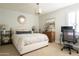 Relaxing bedroom featuring a comfortable bed, stylish decor, and ample natural light from the window at 28408 N 52Nd Way, Cave Creek, AZ 85331