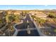 Street view of a gated community with well-maintained landscaping and mountain views at 28408 N 52Nd Way, Cave Creek, AZ 85331