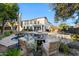 Inviting backyard pool area with in-pool seating and a cozy fire pit for outdoor entertaining at 28408 N 52Nd Way, Cave Creek, AZ 85331