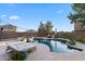 Stunning backyard with a pool, spa, and sun loungers, creating a perfect space for relaxation and entertainment at 28408 N 52Nd Way, Cave Creek, AZ 85331