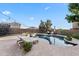 Private backyard oasis featuring a sparkling pool, spa, and sun loungers for ultimate relaxation at 28408 N 52Nd Way, Cave Creek, AZ 85331