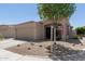 Charming single-story home featuring a neutral color palette, two-car garage, and manicured desert landscaping at 3105 E Amber Ridge Way, Phoenix, AZ 85048