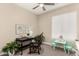 Cozy home office space with a desk, comfortable chair, and a window for natural light at 3105 E Amber Ridge Way, Phoenix, AZ 85048
