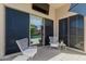 Cozy patio with comfortable seating, views of the pool, and privacy screens at 3105 E Amber Ridge Way, Phoenix, AZ 85048