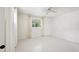 Airy bedroom featuring white curtains, a ceiling fan, and large window for natural light at 3202 N 21St St, Phoenix, AZ 85016