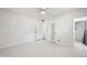 Spacious bedroom with ensuite bathroom and a ceiling fan for comfortable living at 3202 N 21St St, Phoenix, AZ 85016