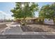 Inviting single-story home with a spacious driveway and xeriscaped front yard for low-maintenance appeal at 3202 N 21St St, Phoenix, AZ 85016