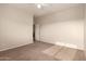 A beige bedroom with carpet, a ceiling fan, and neutral walls at 337 N 103Rd Pl, Apache Junction, AZ 85120