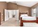Primary bedroom features a walk-in closet and an ensuite bathroom at 337 N 103Rd Pl, Apache Junction, AZ 85120