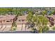 Townhomes with 2-car garages in a desert landscape with tile roofs at 3800 S Cantabria Cir # 1077, Chandler, AZ 85248