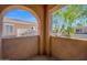Picturesque balcony framing a view of neighboring houses with terracotta roofs against a clear blue sky at 3800 S Cantabria Cir # 1077, Chandler, AZ 85248