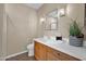 Bright bathroom featuring a modern vanity with storage and a decorative mirror at 3800 S Cantabria Cir # 1077, Chandler, AZ 85248