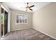 Cozy bedroom with plush carpeting and view of private balcony at 3800 S Cantabria Cir # 1077, Chandler, AZ 85248