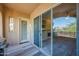 Inviting outdoor patio featuring a grill, sliding doors, and scenic views with stylish decor at 3800 S Cantabria Cir # 1077, Chandler, AZ 85248